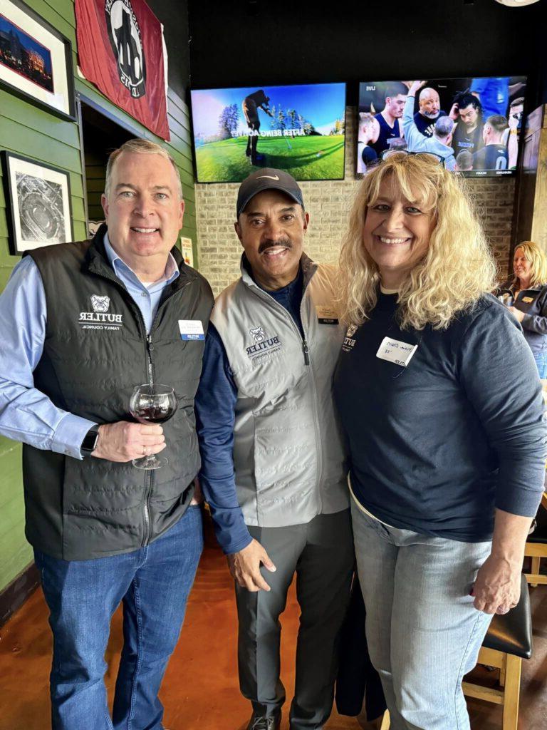 Family Council members pose next to each other in Chatham Tap